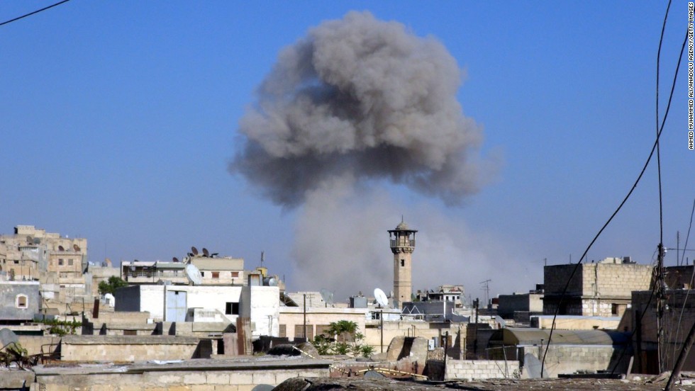 Smoke trails over Aleppo following barrel bombs that were allegedly dropped by the Syrian regime on an opposition-controlled area on Monday, August 11.