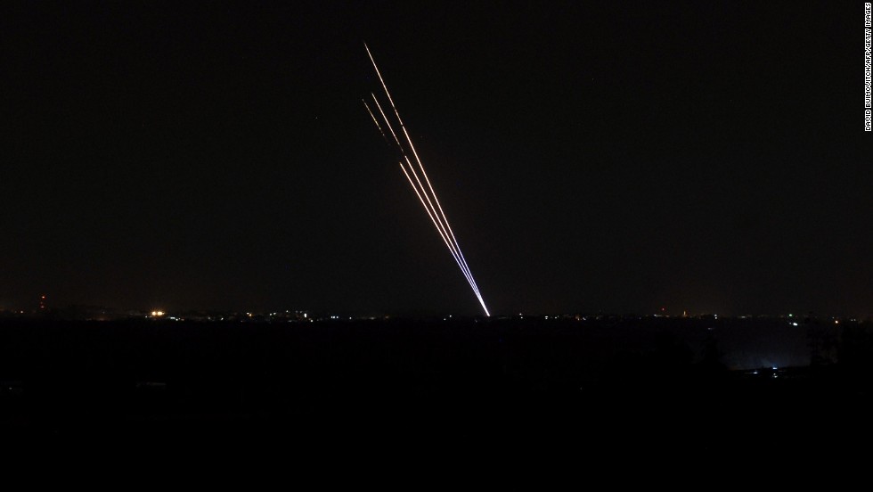 Light trails made by rockets fired from the Gaza Strip stand out against the night sky on Tuesday, August 19. Despite efforts to come to a peaceful agreement, Gaza militants launched rockets into Israel on Tuesday, and Israel responded with its own rockets.