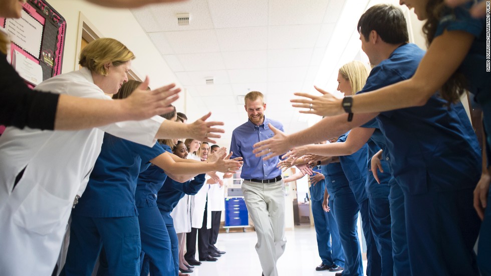 Dr. Kent Brantly leaves Emory University Hospital on August 21, 2014, after being declared no longer infectious from the Ebola virus. Brantly was one of two American missionaries brought to Emory for treatment of the deadly virus.