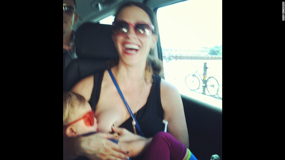 Singer Alanis Morissette posted this more down to earth photo of herself breastfeeding her son Ever while on tour. &lt;a href=&quot;http://instagram.com/p/rOgEbCOYM3/&quot; target=&quot;_blank&quot;&gt;Her message&lt;/a&gt;: &quot;family on tour ;) europe 2012 #worldbreastfeedingweek #isupportyou.&quot;