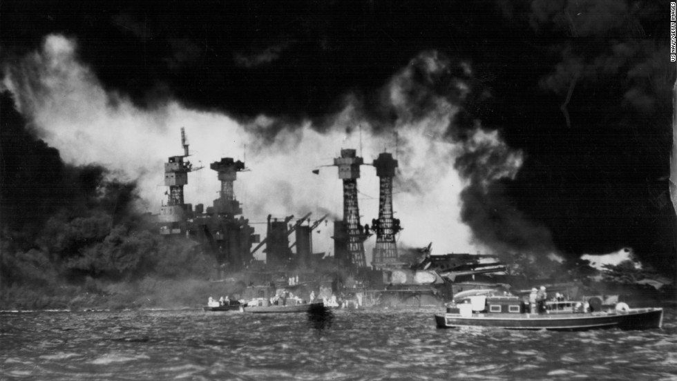 A view of U.S. ships in Pearl Harbor, Hawaii, after the Japanese attack on December 7, 1941. The USS West Virginia and USS Tennessee are in the foreground. The attack destroyed more than half the fleet of aircraft and damaged or destroyed eight battleships. Japan also attacked Clark and Iba airfields in the Philippines, destroying more than half the U.S. Army&#39;s aircraft there. 