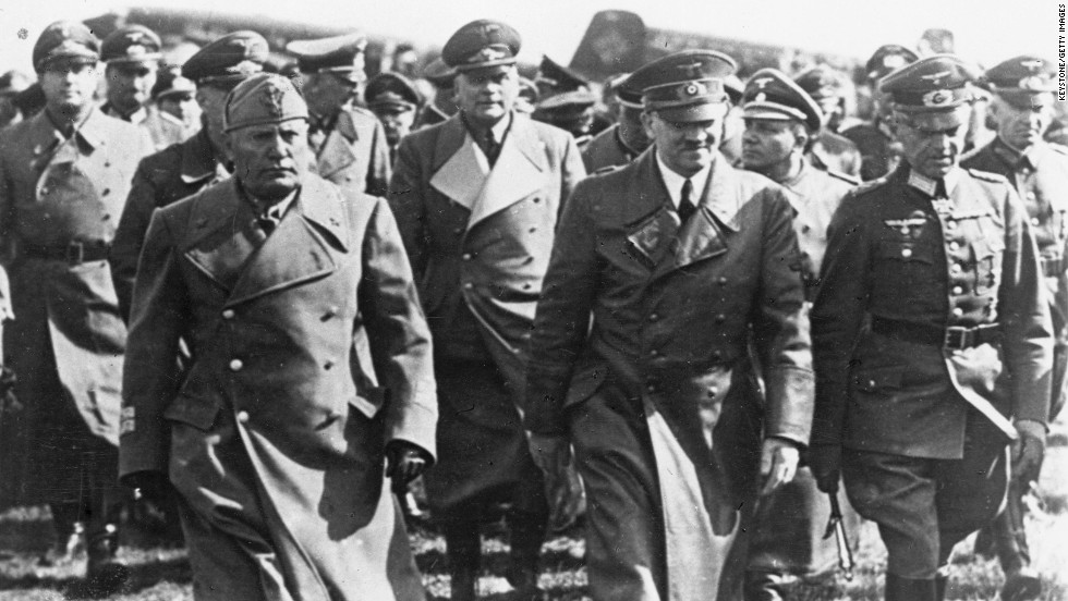 Italian dictator Benito Mussolini, left, with Hitler, center, and other leading Nazis, visits Germany during the war. Italy and Germany formed an alliance before the outbreak of war, but Italy remained a non-belligerent until June 10, 1940, when it declared war on Britain and France. Fighting spread to Greece and North Africa.