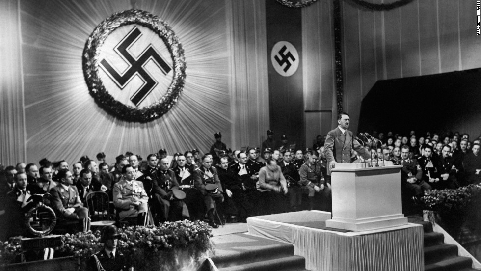 German Chancellor Adolf Hitler speaks to Nazi party officials in 1939, the year of the German blitzkrieg into Poland. Denmark, Luxembourg, the Netherlands, Norway and Belgium soon fell under German control. When France came under occupation less than a year later, Britain was the only remaining Western European nation fighting the Third Reich, and the United States had not yet entered the war.