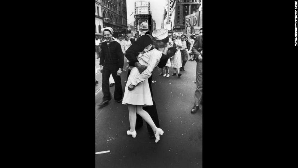 A jubilant American sailor kisses a nurse in New York&#39;s Times Square on August 14, 1945, as he celebrates the news that Japan has surrendered. (Because of the time difference between the two nations, the surrender occurred August 15 in Japan).