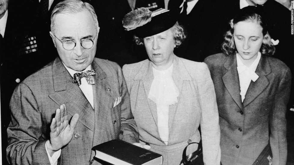 Harry S. Truman takes the oath of office on April 12, 1945, as he becomes the 33rd president of the United States. Standing beside him are his wife, Bess, and daughter Margaret.