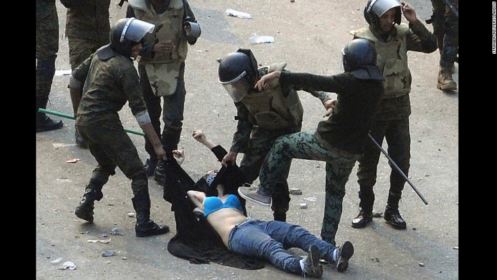 Egyptian army soldiers arrest a female protester during clashes at Tahrir Square in Cairo on December 17, 2011. On January 25, people took to the streets in demonstrations against corruption and failing economic policies. From the beginning, the revolution in Egypt was propelled by the use of social media. The events in Egypt served as a flash point for journalists on the ground, too. For perhaps one of the first times, history itself has been recorded instantaneously, as reporters took to Twitter to share 140-character updates and personal stories from the protests.