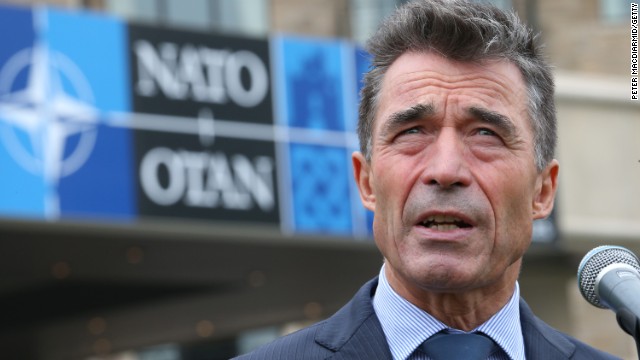 Caption:NEWPORT, WALES - SEPTEMBER 04: NATO Secretary General Anders Fogh Rasmussen talks to reporters at the NATO Summit on September 4, 2014 in Newport, Wales. Leaders and senior ministers from around 60 countries are gathering for the two day meeting where Ukraine and the ISIS hostages are likely to be discussed. (Photo by Peter Macdiarmid/Getty Images)