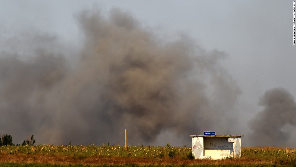 Smoke rises on the outskirts of Mariupol after pro-Russian rebels fired heavy artillery on September 5.