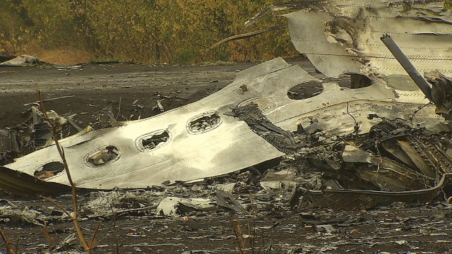 MH17 crash site abandoned amidst war