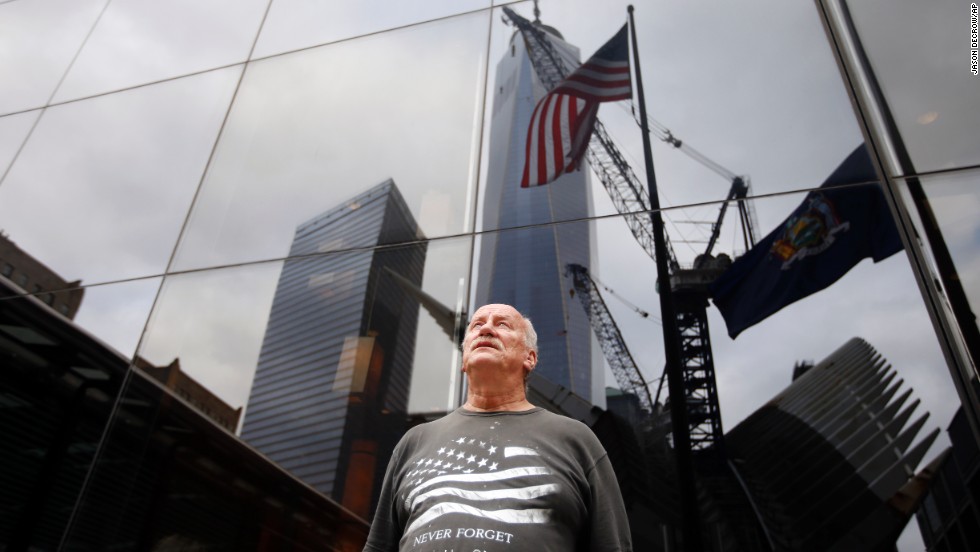 Tyrone McClave, of Bristol, Pennsylvania, looks up at One World Trade Center during a moment of silence in New York. 