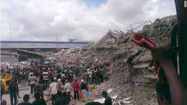 People search for survivors after a church building collapsed in Lagos, Nigeria. 