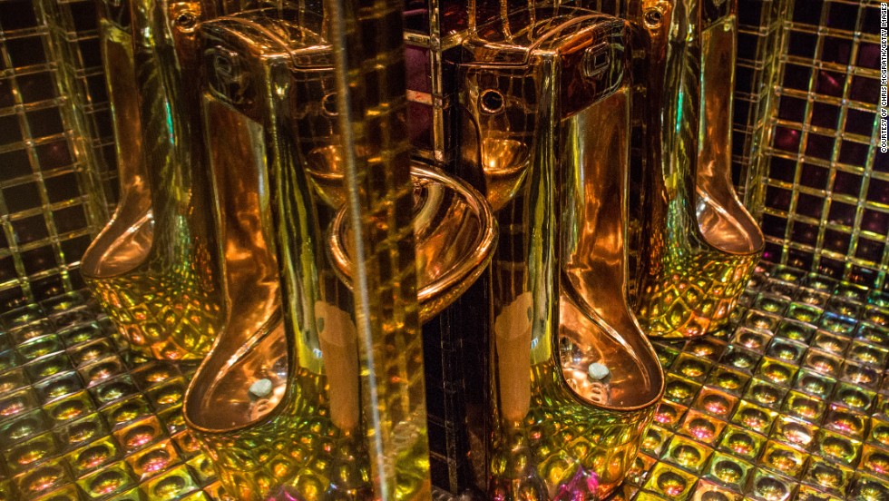 Gold colored urinals are seen in the men&#39;s bathroom at The Robot Restaurant in Tokyo, Japan. The now famous Robot Restaurant opened two years ago in Kabukicho area of Shinjuku at an estimated cost of 10 million U.S. dollars. 
