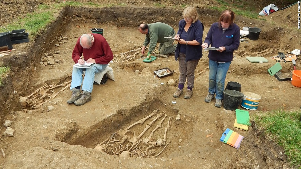 The team of archaeologists and volunteers record their findings at the chapel and the cemetery.