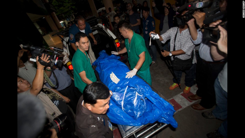 Miller&#39;s body is carried to a forensic police facility in Bangkok on Tuesday, September 16.