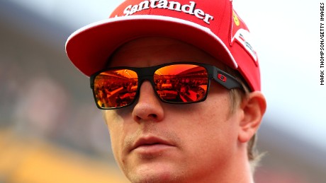 SINGAPORE - SEPTEMBER 21: Kimi Raikkonen of Finland and Ferrari takes part in the drivers&#39; parade before the Singapore Formula One Grand Prix at Marina Bay Street Circuit on September 21, 2014 in Singapore, Singapore. (Photo by Mark Thompson/Getty Images)