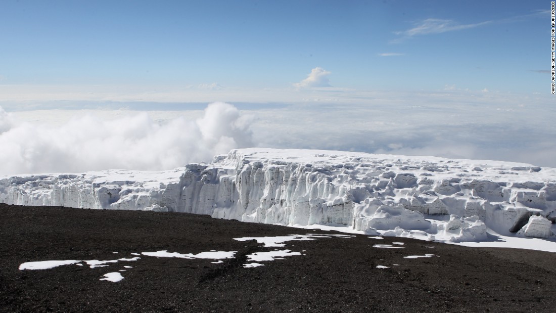 The snows capping majestic Mount Kilimanjaro, Africa&#39;s highest peak, once inspired Ernest Hemingway. Now they&#39;re in danger of melting away altogether. Studies suggest that if the mountain&#39;s snowcap continues to evaporate at its current rate, it could be gone in 15 years. Here, a Kilimanjaro glacier is viewed from Uhuru Peak in December 2010.