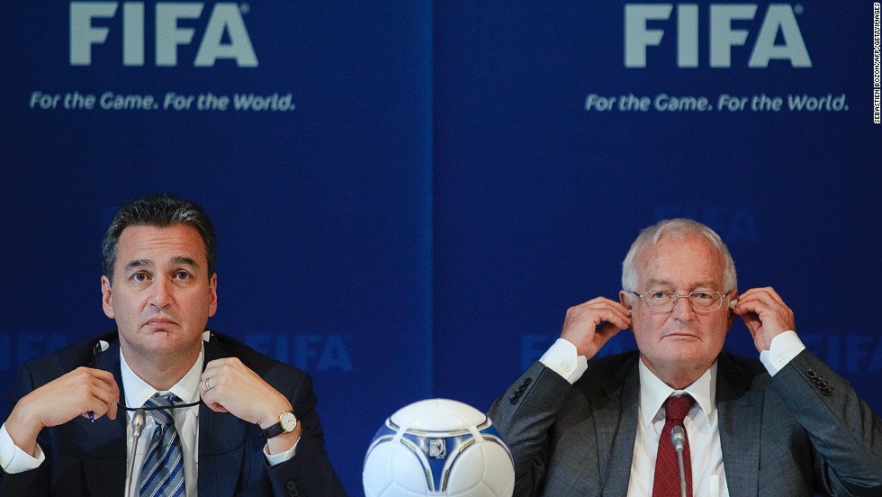 Michael Garcia (left) handed his report on the bidding process for the 2018 / 2022 World Cups to the FIFA Ethics Committee. Garcia has also called for the findings of his report to be made public.