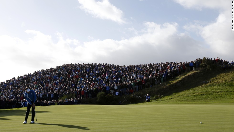 Ian Poulter, one of the stars of Europe&#39;s miracle win at Medinah two years ago, putts on the seventh green on Friday morning. Tens of thousands of spectators are attending the three-day event in Perthshire, Scotland. 