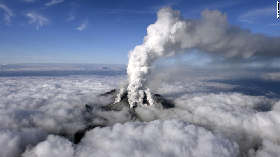 Dense white plumes rise high in the air as Mount Ontake erupts in central Japan in September 2014. 