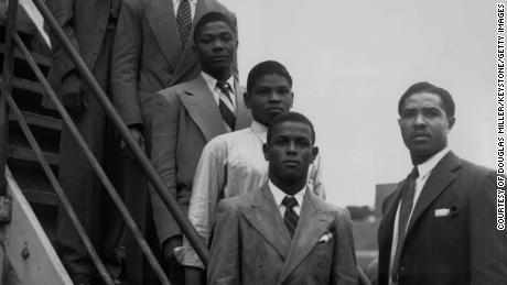 22nd June 1948: From the top, hopeful Jamaican boxers Charles Smith, Ten Ansel, Essi Reid, John Hazel, Boy Solas and manager Mortimer Martin arrive at Tilbury on the Empire Windrush in the hope of finding work in Britain.