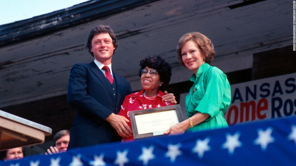 Clinton was elected governor of Arkansas in 1978. He is seen here with civil rights activist Rosa Parks and first lady Rosalynn Carter in July 1979.