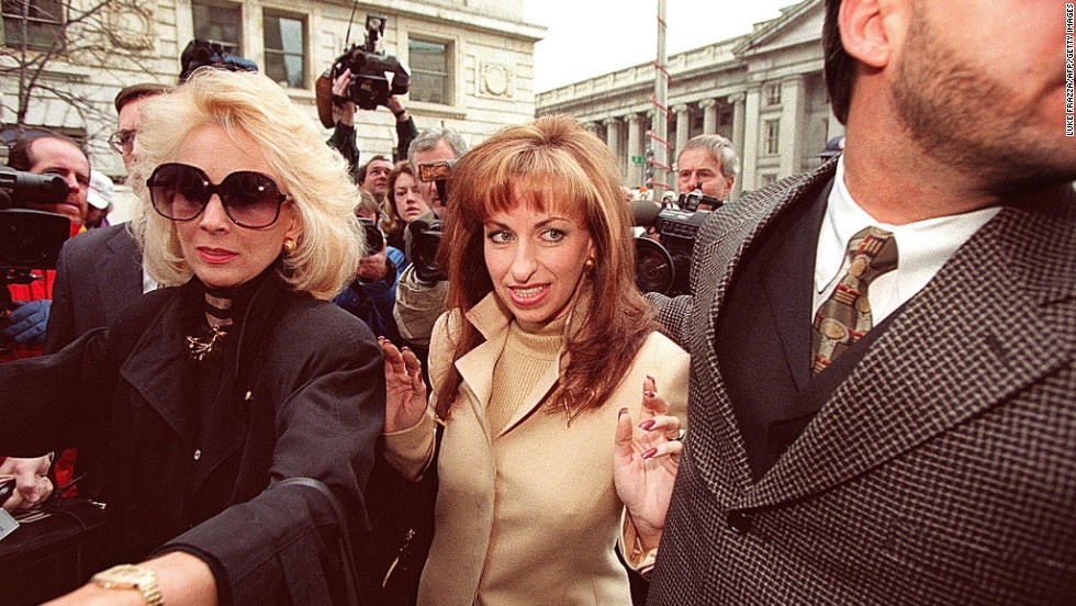 Paula Jones, center, arrives at the office of a lawyer representing Clinton in January 1998. The former Arkansas state employee filed a federal civil lawsuit in 1994 accusing Clinton of making &quot;persistent and continuous&quot; unwanted sexual advances during a conference in 1991, when he was governor. The President agreed to an $850,000 settlement in November 1998.