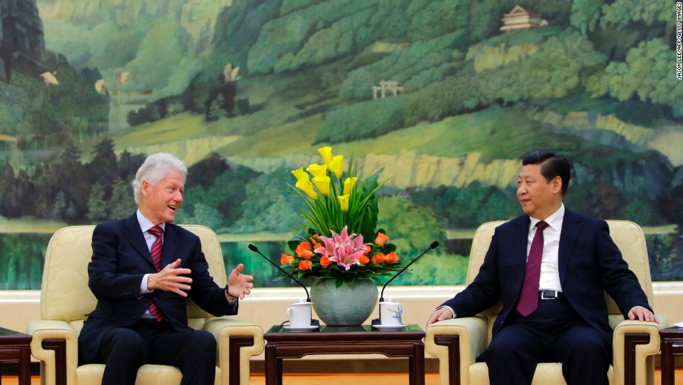 Clinton speaks to Chinese President Xi Jinping during a meeting in Beijing in November 2013.