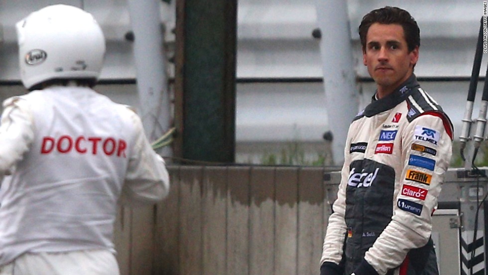 A visibly distressed Adrian Sutil witnessed the crash. Bianchi collided with a recovery vehicle that was attempting to move the German&#39;s Sauber.