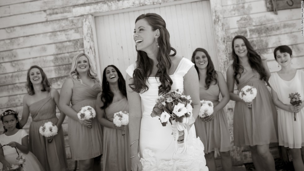 Maynard shares a moment with her bridesmaids on her wedding day.