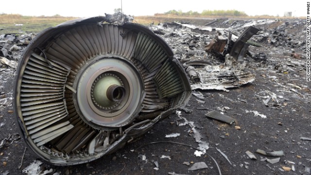 Debris from Malaysia Airlines Flight 17 sits in a field at the plane crash site in Hrabove, Ukraine.