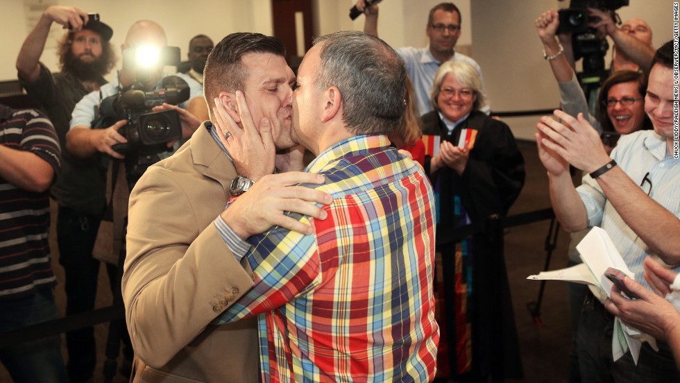 Chad Biggs, left, and Chris Creech say their wedding vows at the Wake County Courthouse in Raleigh, North Carolina, on October 10, 2014, after a federal judge ruled that same-sex marriage can begin in the state.