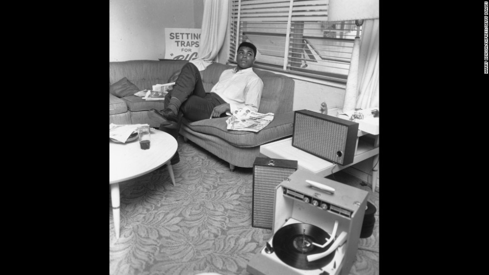 Ali relaxes after his win over Liston in 1964. At 22, he became the youngest boxer to take the heavyweight title from a reigning champion.