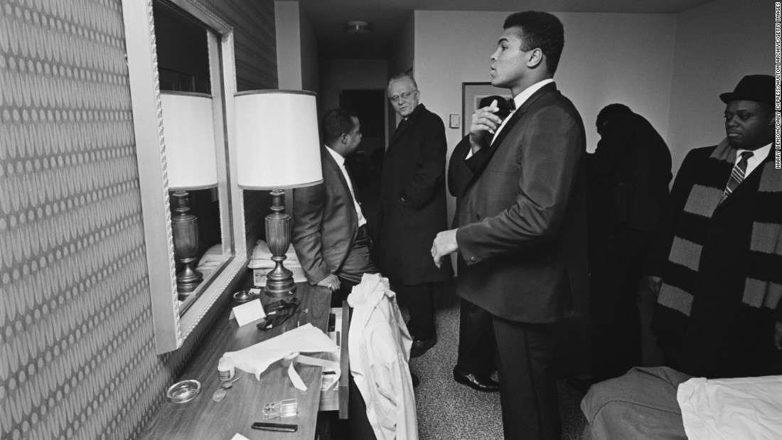 Ali looks in his hotel-room mirror in February 1967.