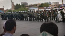 141014120154 china xinjiang soldiers hp video 12 face execution for deadly China attacks