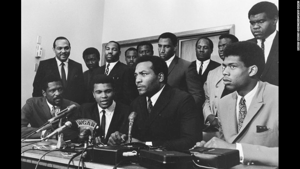 African-American athletes have a long history of speaking up in defense of civil rights. In 1967 a group of top athletes from various sports gathered to support Muhammad Ali in rejecting the draft during the Vietnam War. Seated in the front row, from left to right: Bill Russell, Ali, Jim Brown and Lew Alcindor (now Kareem Abdul-Jabbar). Standing behind them are Carl Stokes, Walter Beach, Bobby Mitchell, Sid Williams, Curtis McClinton, Willie Davis, Jim Shorter and John Wooten.