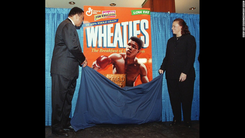 Ali and his fourth wife, Lonnie, unveil his special-edition Wheaties box in February 1999. The box marked the cereal&#39;s 75th anniversary, and it was the first time a boxer appeared on the cover.