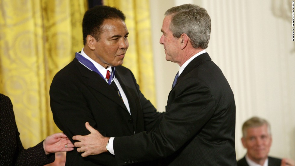 U.S. President George W. Bush presents Ali with the Presidential Medal of Freedom, the nation&#39;s highest civilian honor, on November 9, 2005.