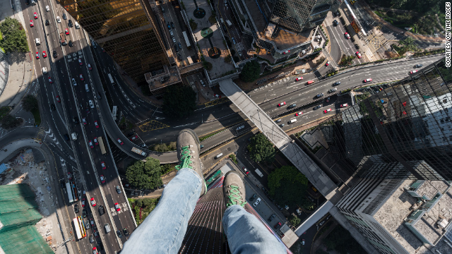 This sort-of selfie, taken by Russian thrillseekers On the Roofs in Hong Kong, would be frowned upon by police in their home country.