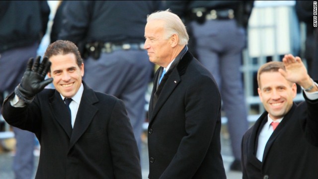 US President Trump pressed his Ukrainian counterpart Volodymyr Zelensky to investigate former US Vice President Joe Biden (pictured center), and his son Hunter (left).
