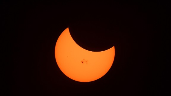 Moon clipped sun like a fingernail during eclipse - CNN