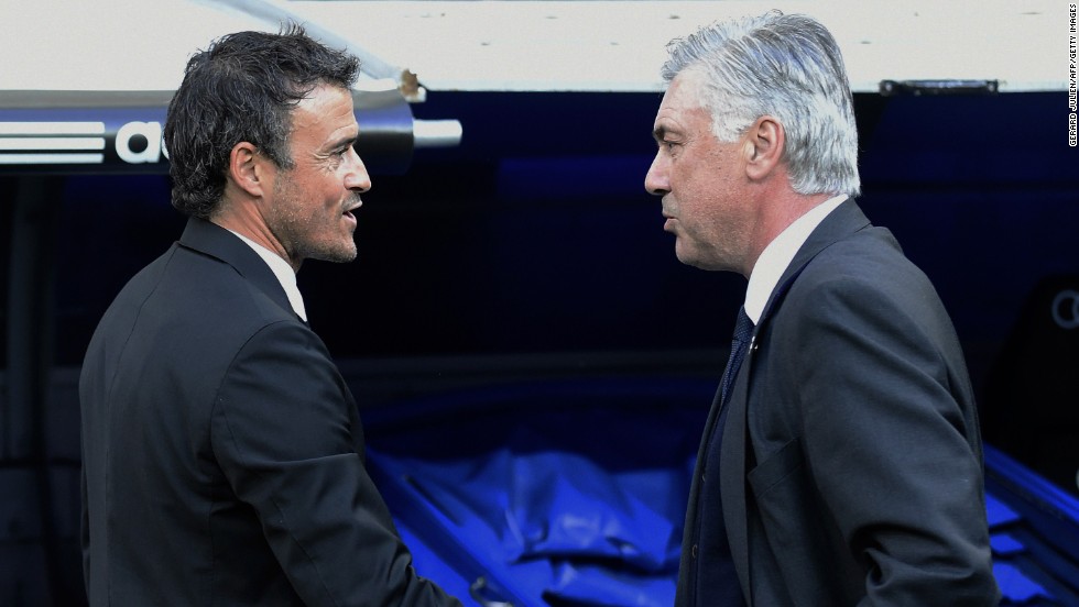 Barcelona coach Luis Enrique (left) talks with Real Madrid&#39;s Italian coach Carlo Ancelotti before the match.