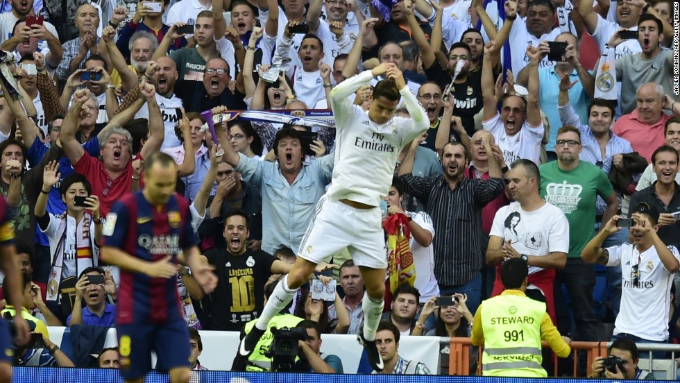 Cristiano Ronaldo celebrates scoring Real Madrid&#39;s equalizer in front of an ecstatic home crowd. His 35th minute penalty brought an end to Barcelona keeper Claudio Bravo&#39;s record of eight clean sheets in the opening eight matches of the La Liga season. 