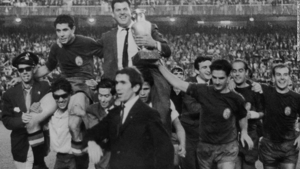 The Spanish football team bear their manager, Jose Villalonga, aloft to celebrate their victory in the 1964 European Nations Cup, when they beat the Soviet Union 2-1 at the Santiago Bernabeu.