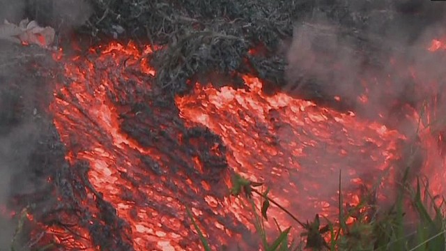 Lava flow advances on Hawaii town; evacuations possible - CNN