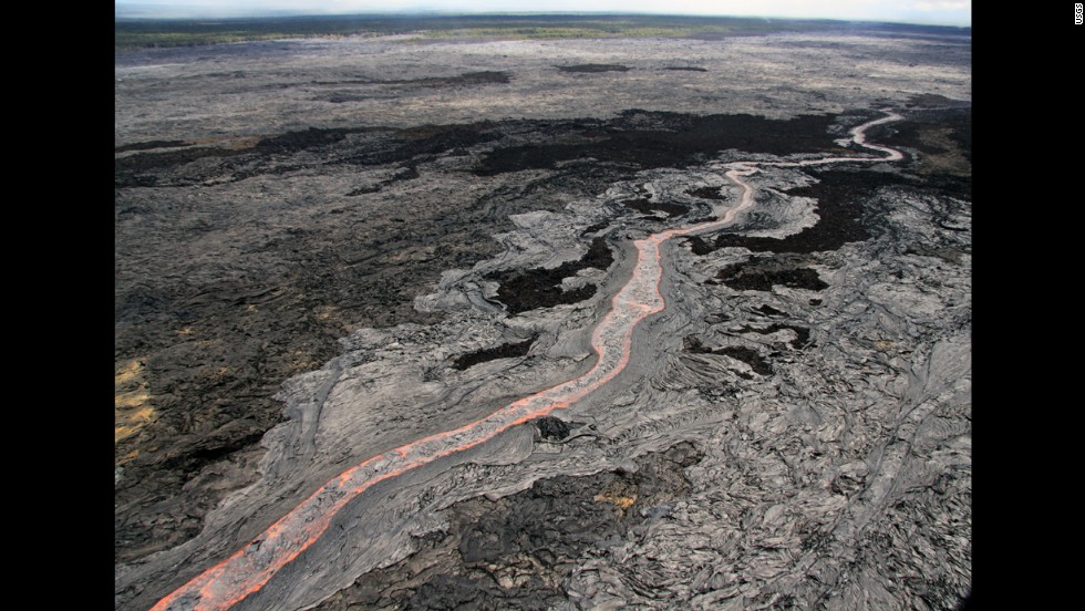 A view of the sinuous, channelized flow that was moving to the northeast from Kilauea on June 27. The flow threatening Pahoa has advanced about 13 miles (21 kilometers) since then. Kilauea is one of the world&#39;s most active volcanoes.