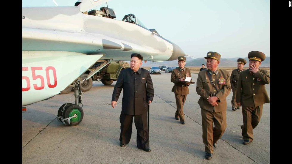 Kim is seen walking with a cane in this image released Thursday, October 30, by the state-run Korean Central News Agency.