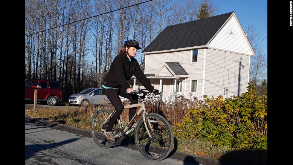 Kaci Hickox leaves her home in Fort Kent, Maine, to take a bike ride with her boyfriend on October 30, 2014. Hickox, a nurse, recently returned to the United States from West Africa, where she treated Ebola victims. State authorities wanted her to avoid public places for 21 days -- the virus&#39; incubation period. But Hickox, who twice tested negative for Ebola,&lt;a href=&quot;http://www.cnn.com/2014/10/30/health/us-ebola/index.html&quot;&gt; said she would defy efforts&lt;/a&gt; to keep her quarantined at home.