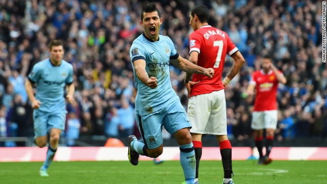 Sergio Aguero celebrates scoring the only goal of the Manchester derby on 2 November 2014.