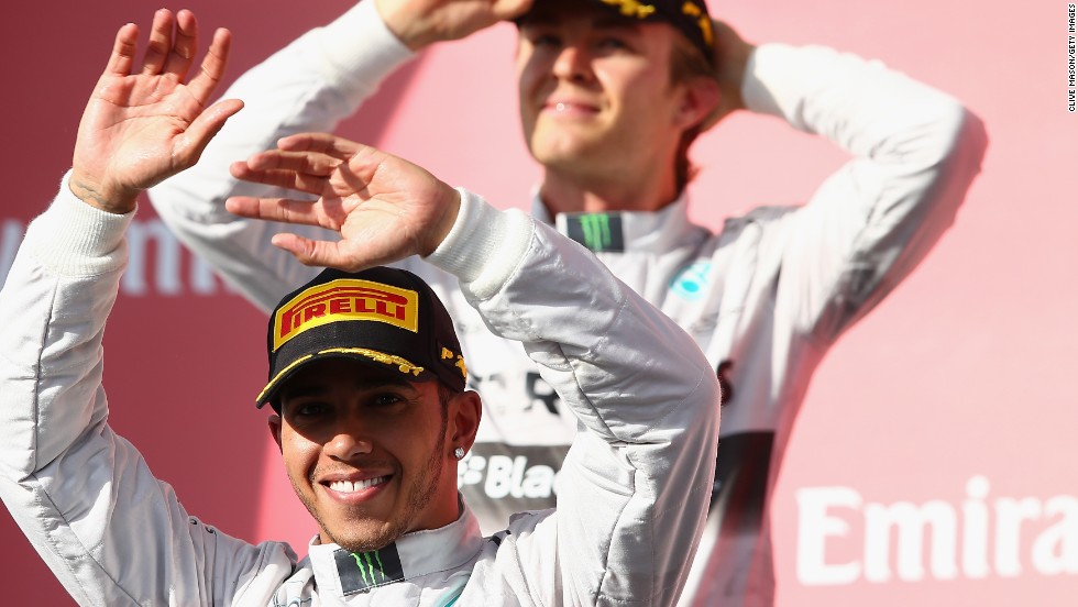 With just two races of the season to go it will be a straight shoot out between the Mercedes pair, seen here donning a sponsors hat, to decide the 2014 champion.