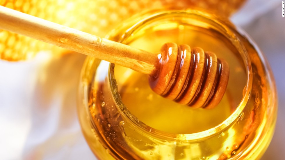 Honey is low in water and high in sugar, so bacteria cannot grow on it. It also contains small amounts of hydrogen peroxide, inhibiting the growth of microbes. 